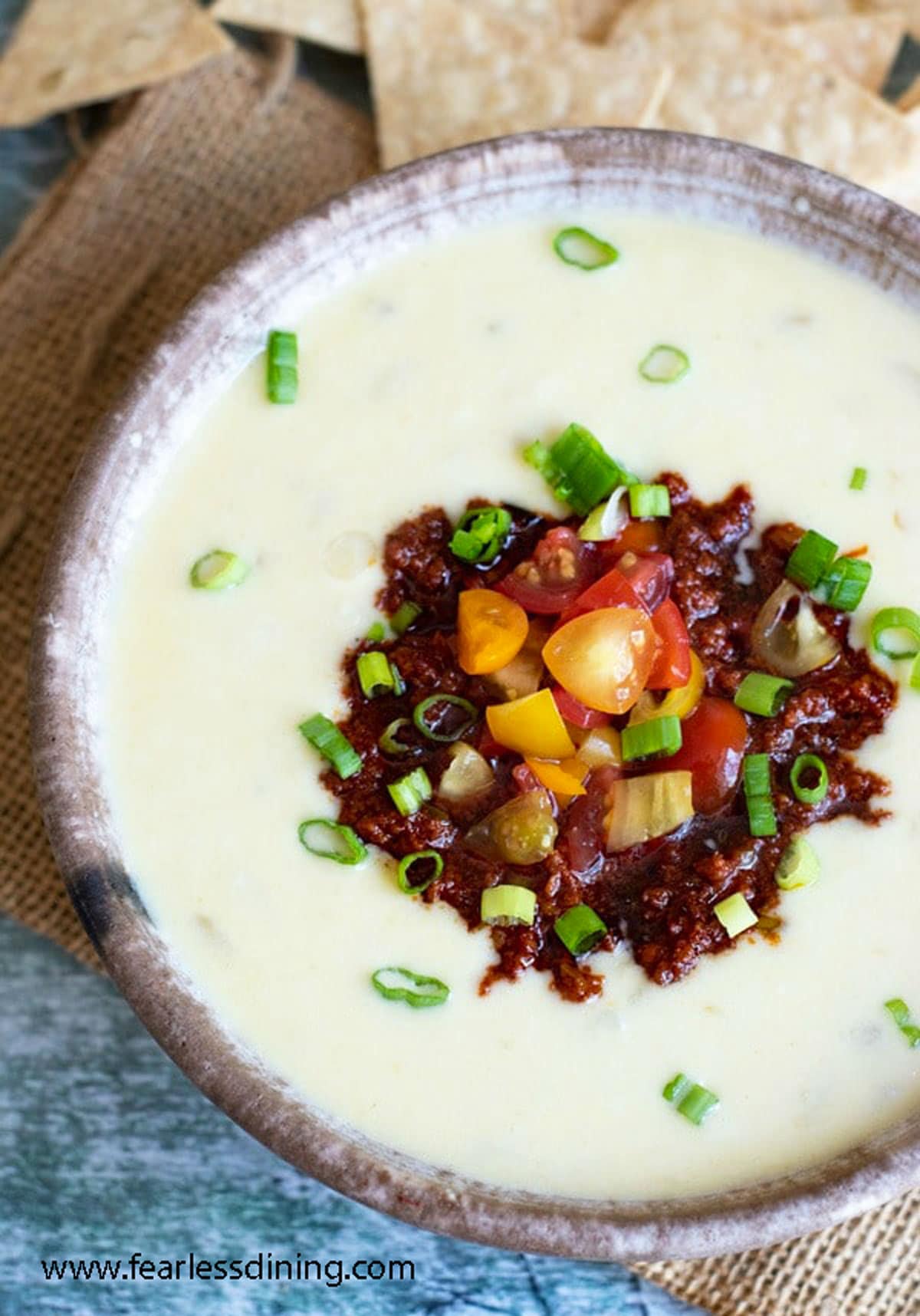 The top view of looking down into a big bowl of stuffed queso.