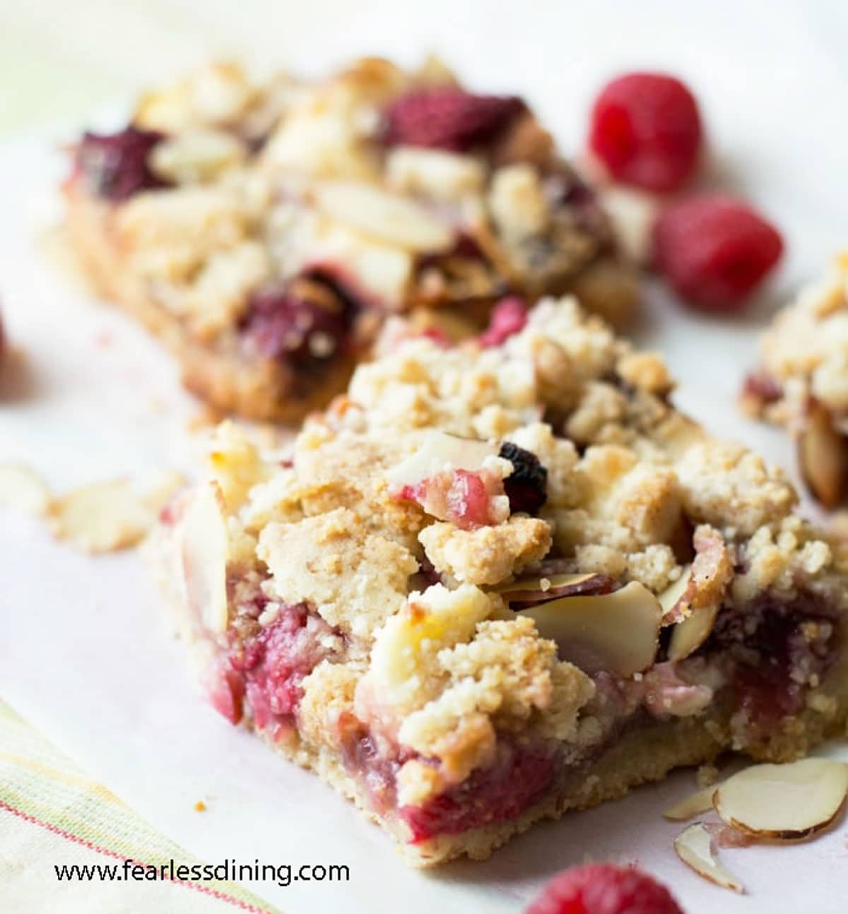 a close up of the raspberry bars