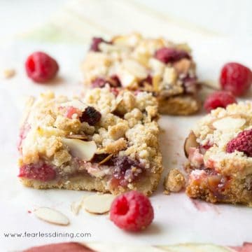 a close up of the raspberry crumble bars