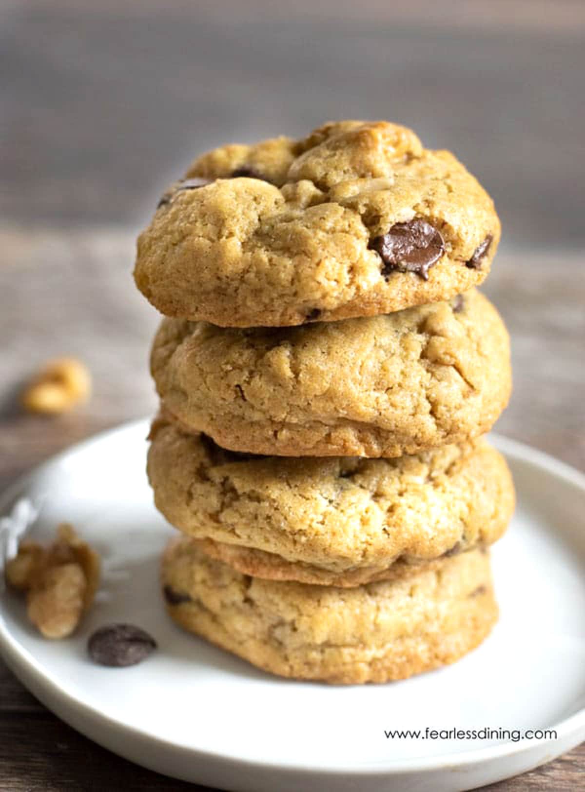 A stack of four chocolate chip cookies.
