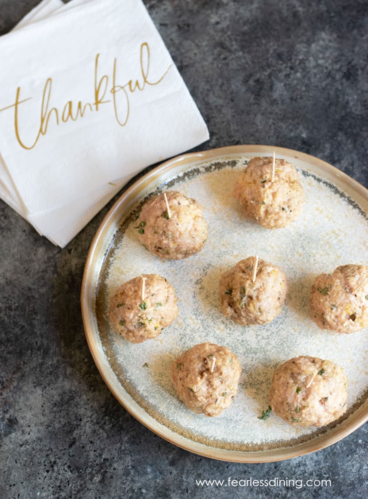 The top view looking down on a platter of chicken meatballs.