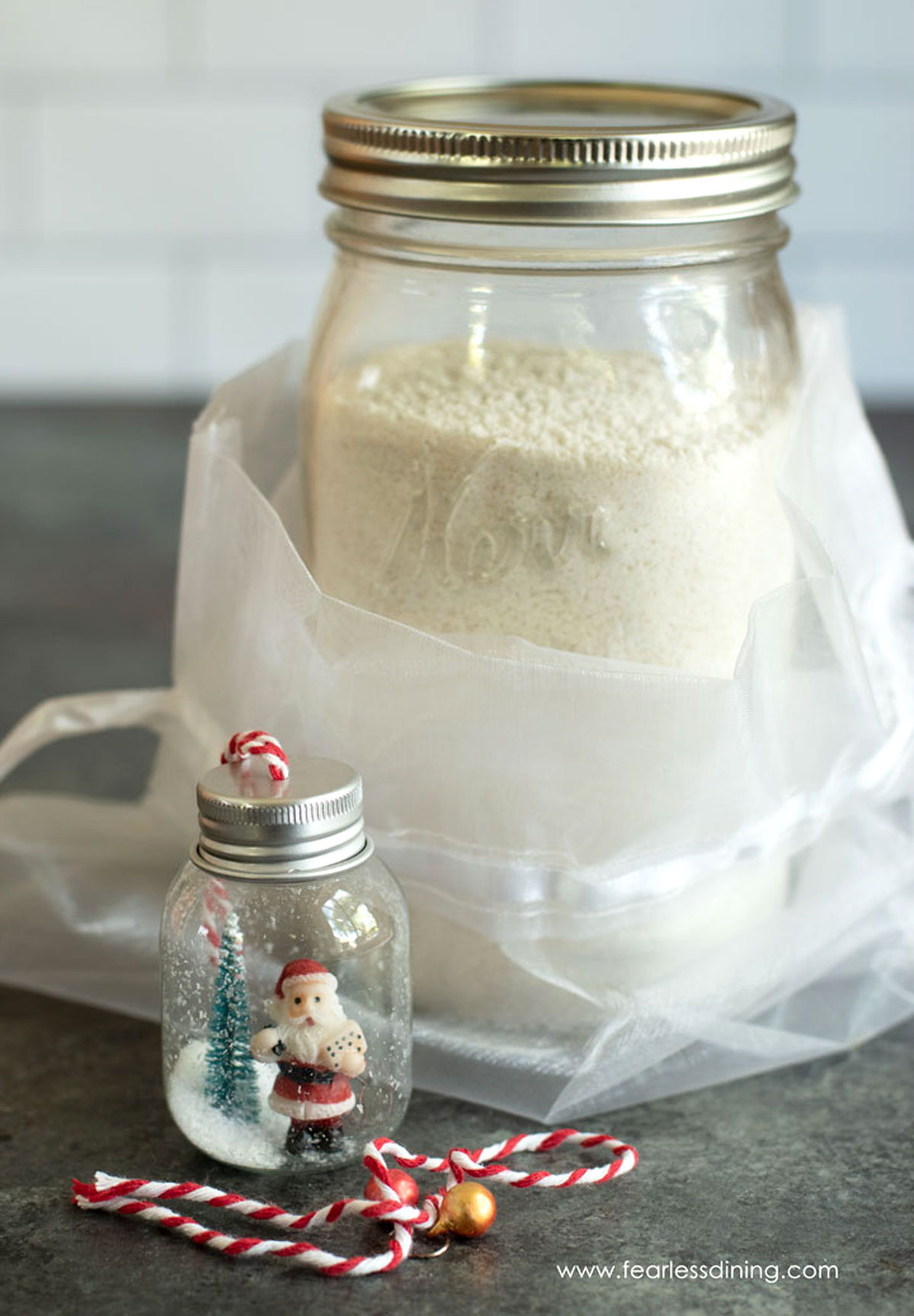 A holiday wrapped mason jar.