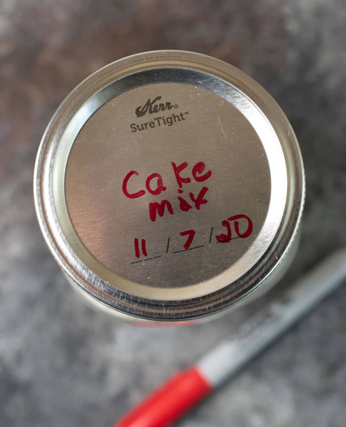 A labeled mason jar lid.