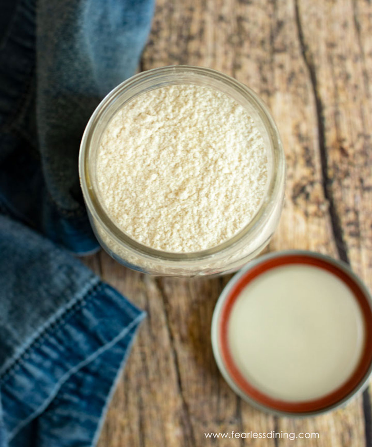 The top view of an open jar of cake mix.