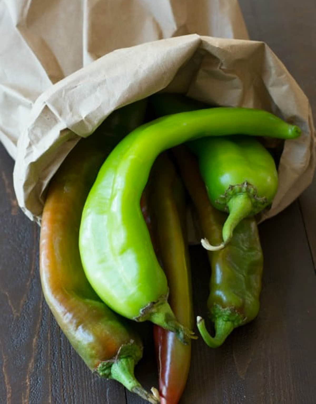 A paper bag full of hatch chiles.