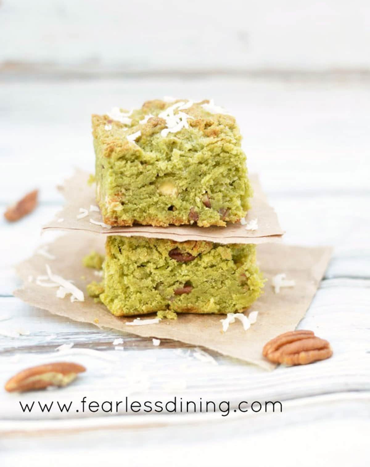 Matcha cookie bars stacked on top of each other.