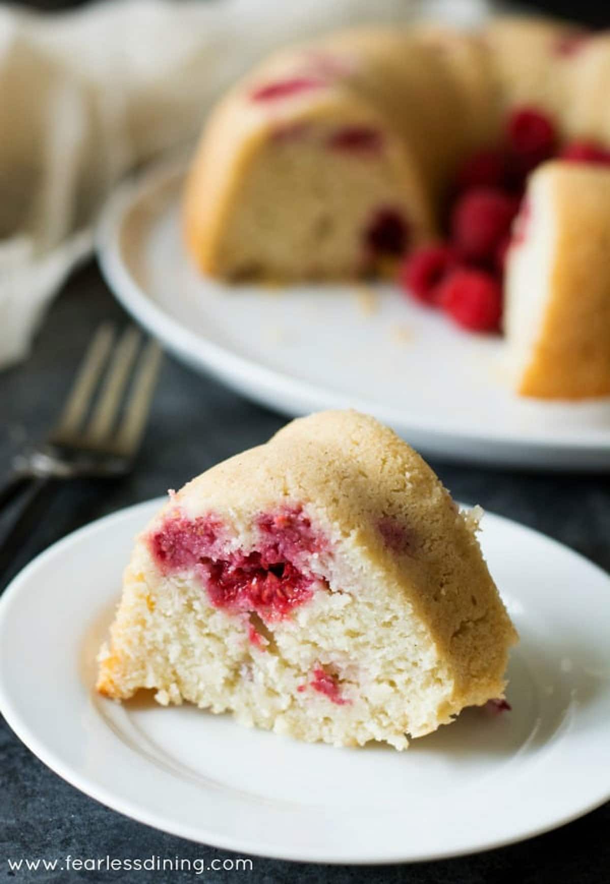 A slice of vanilla raspberry bundt cake.