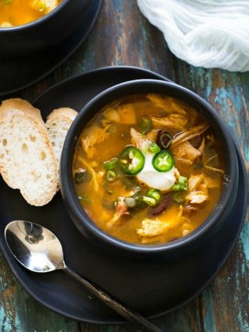 a top view of a bowl of Mexican chicken soup