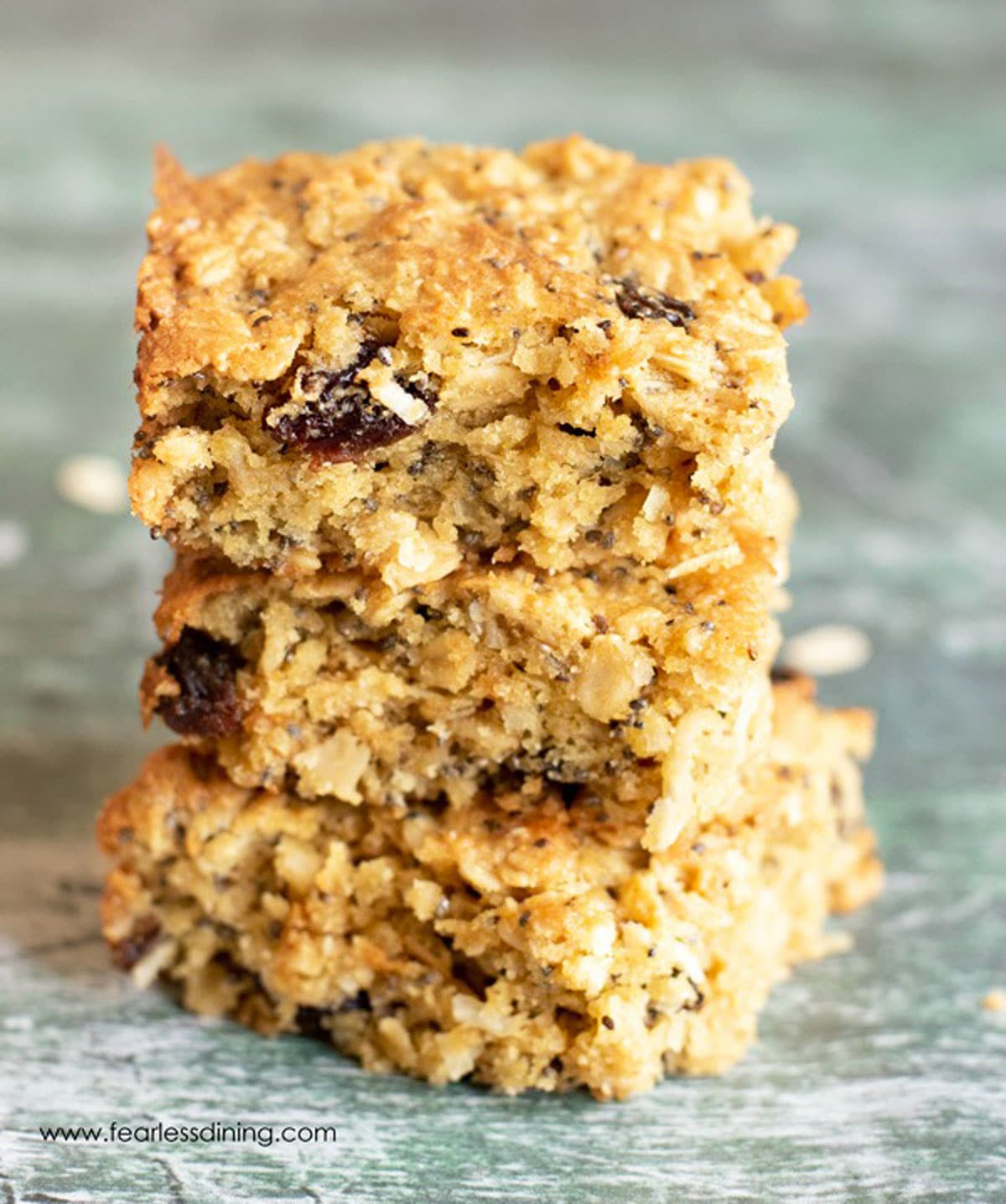 A stack of three breakfast bars on the counter.