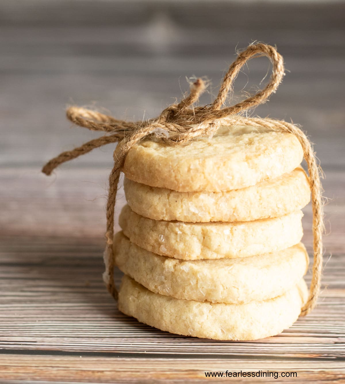 Five sables stacked and tied with twine.