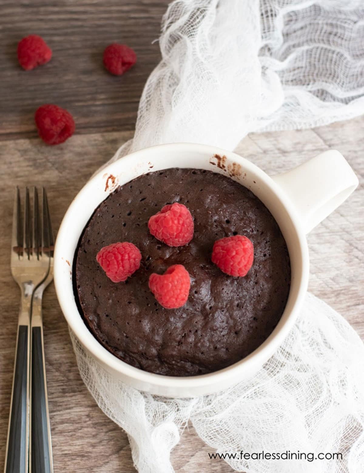 The top view of a chocolate mug cake ready to eat