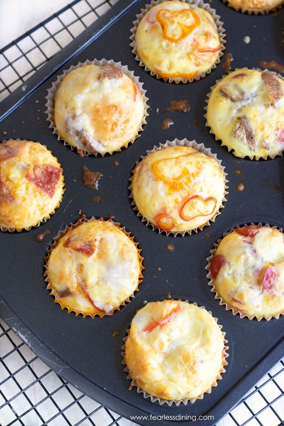 Baked egg muffins in a muffin tin.