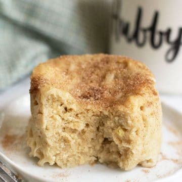 A snickerdoodle mug cake on a plate.