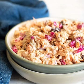 A bowl full of curried tuna salad.