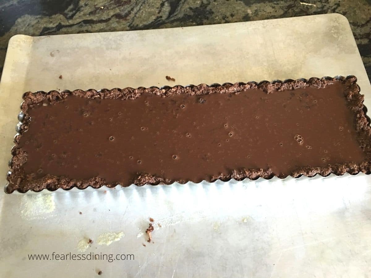 A chocolate tart ready to bake.