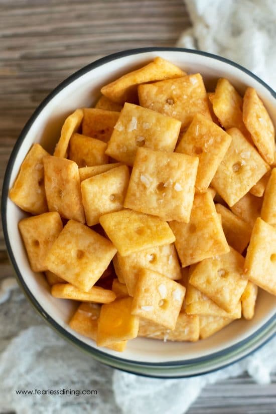 The top view of a big bowl of gluten free Cheez Its.