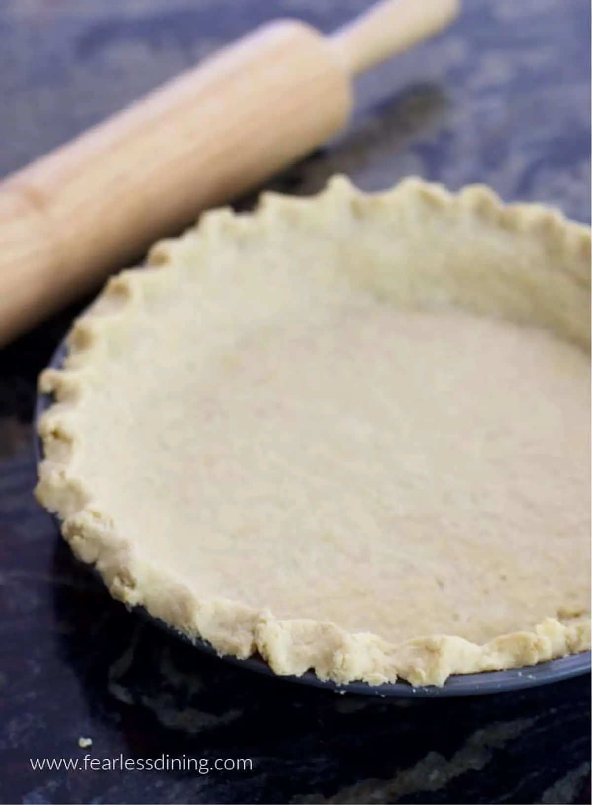 a baked gluten free pie crust on the counter
