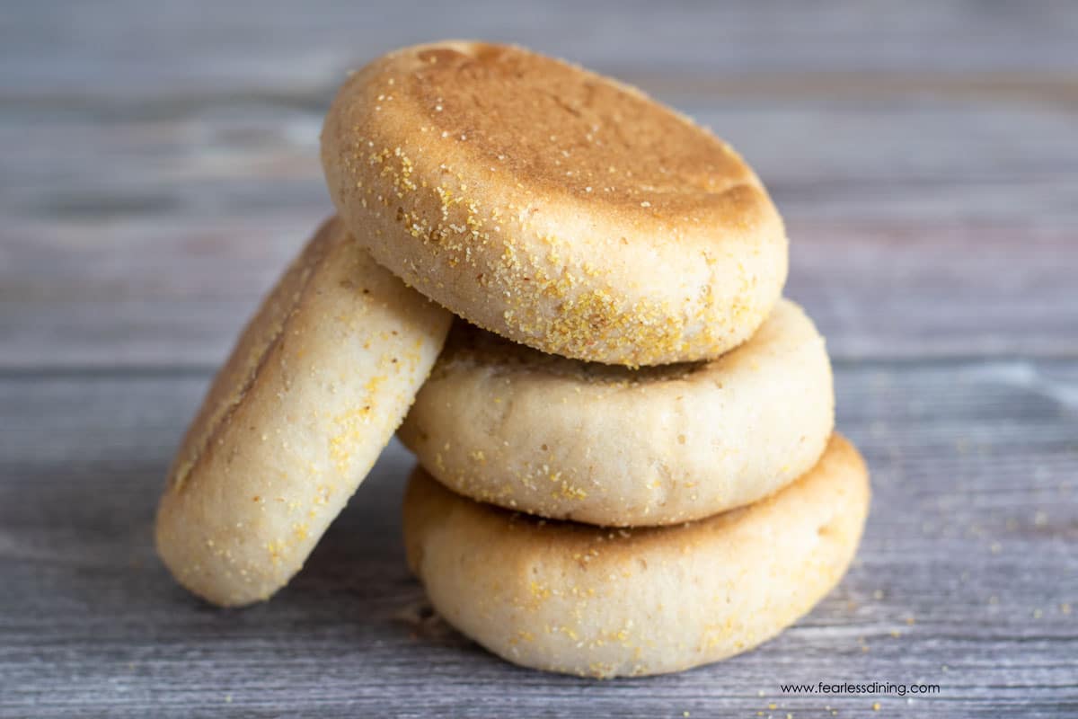 a stack of English muffins on a table