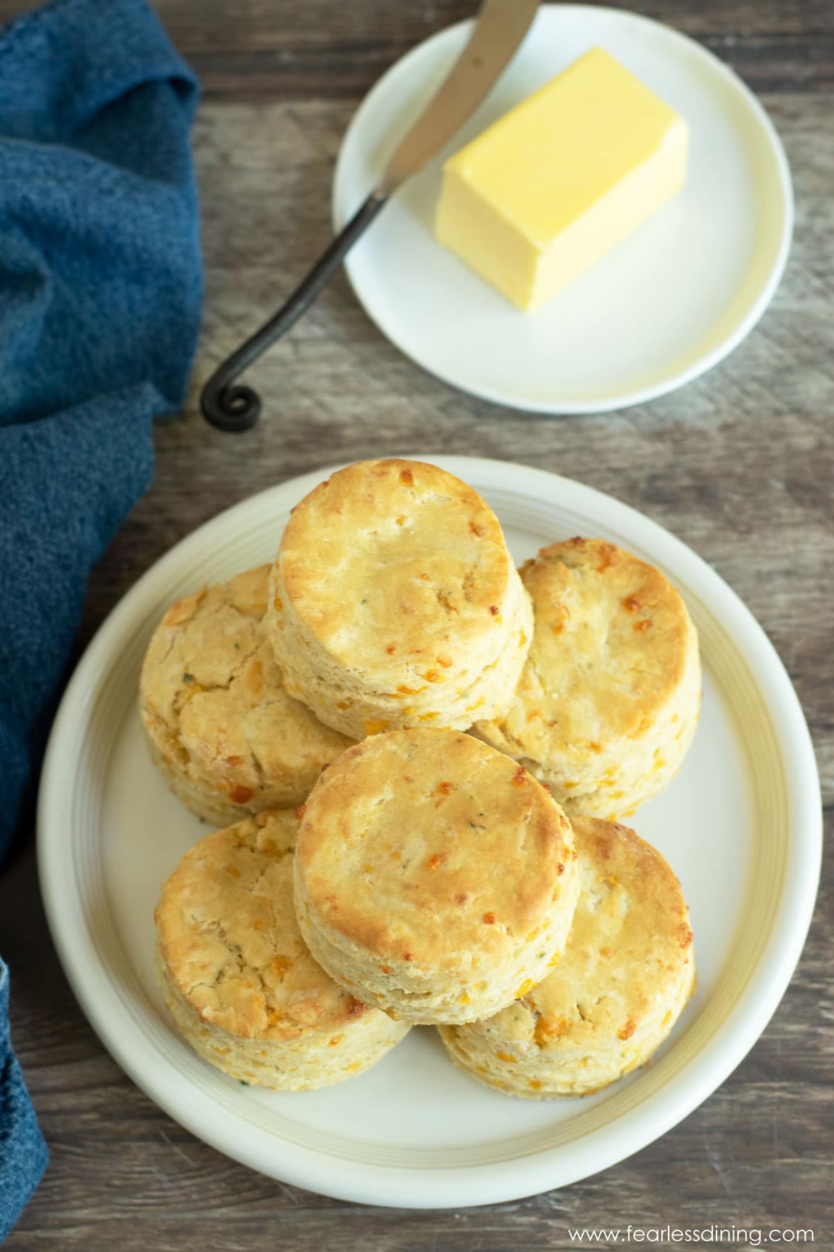 The top view of a plate full of biscuits.