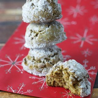 A stack of gluten free pfeffernusse cookies.