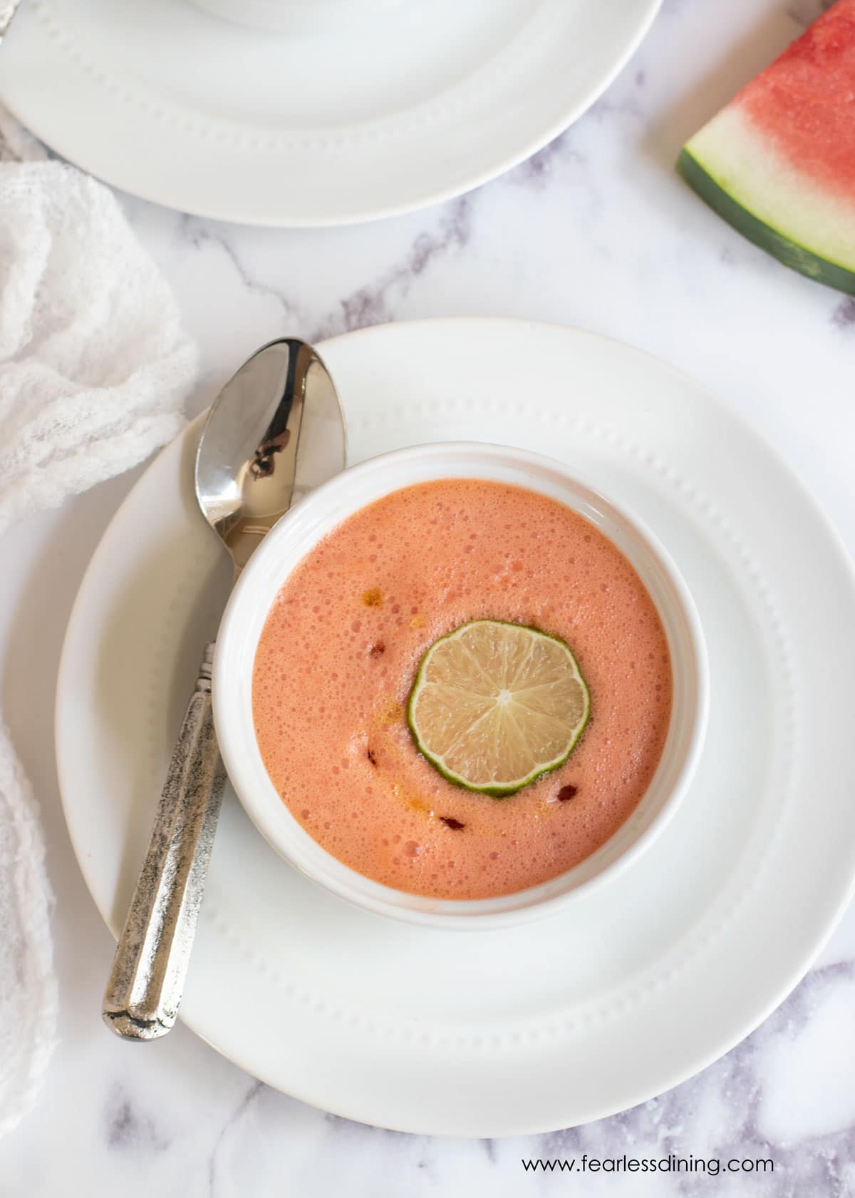 The top view of a bowl of chilled watermelon soup.