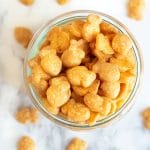 The top of a jar filled with gluten free goldfish crackers.