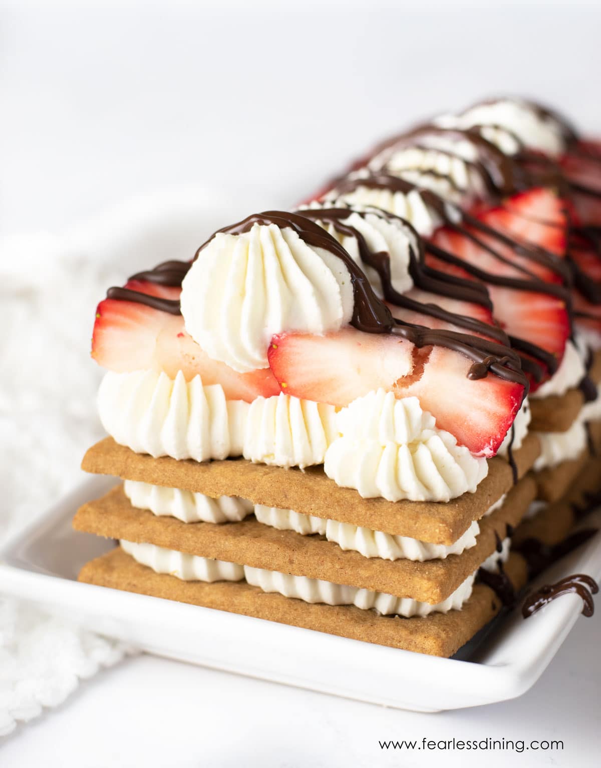 The front view of the icebox cake on a serving dish.