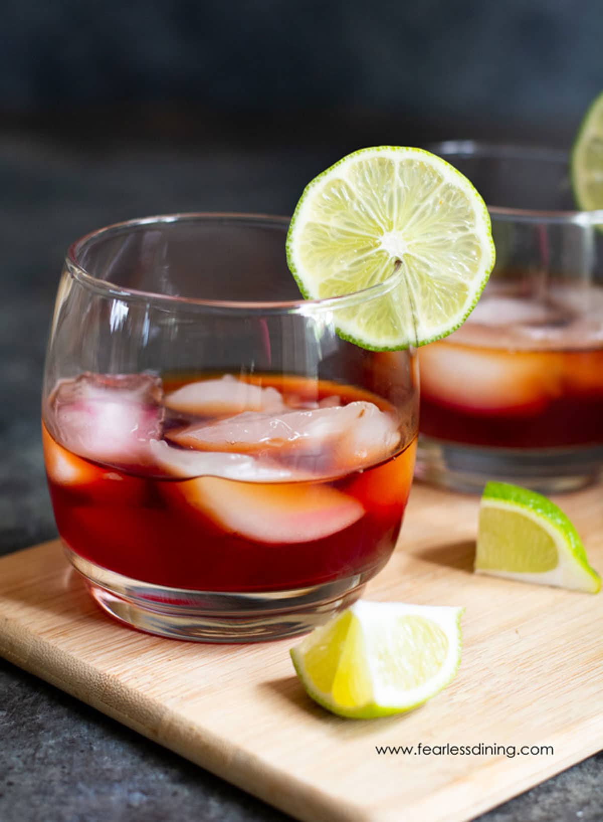 Two glasses of prickly pear bourbon cocktails.