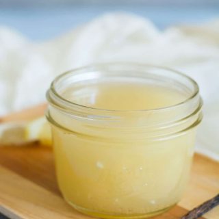 A jar of vanilla cream sauce.