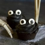 Black cupcakes with large googly eyes for Halloween.