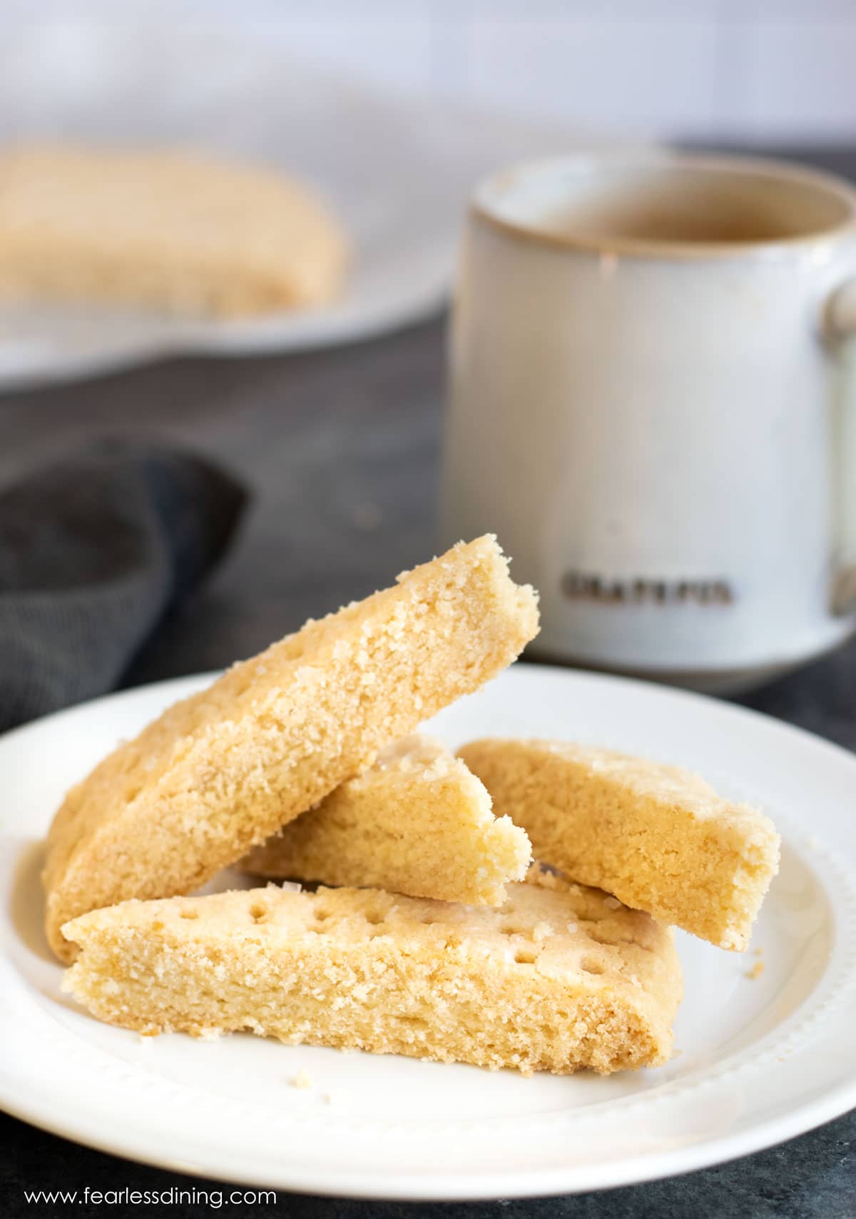 Slices of gluten free shortbread on a plate.