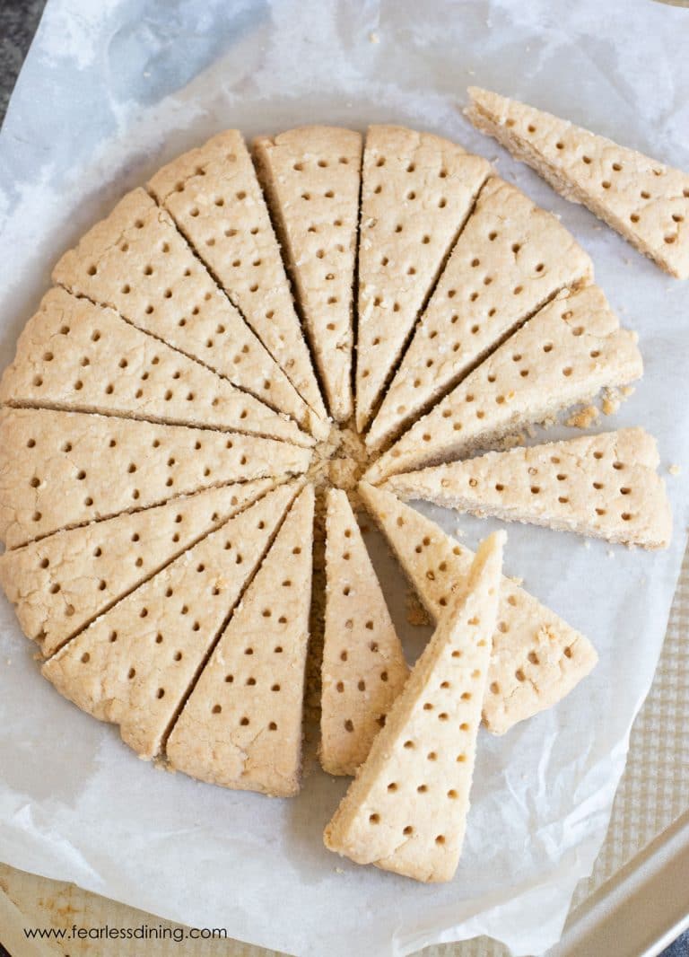 Baked shortbread wedges in a circle.