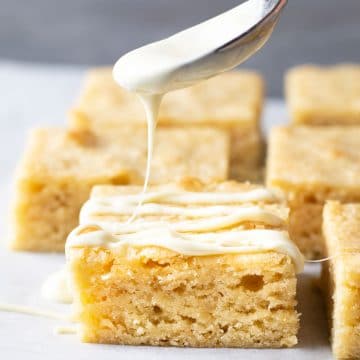 Drizzling white chocolate over a white brownie.