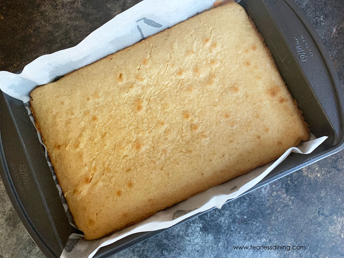 Baked white chocolate brownies in a 9x13 pan.