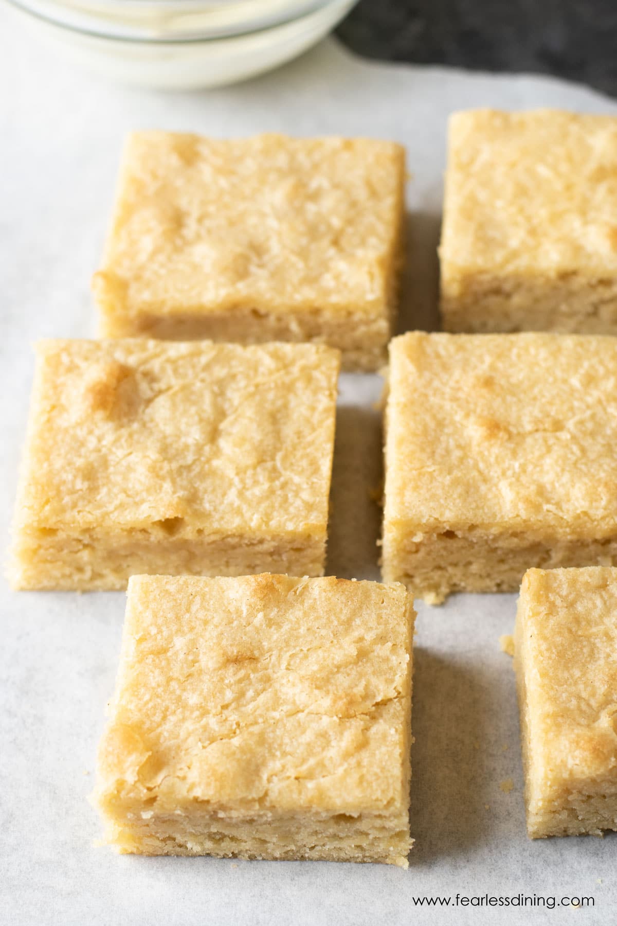 Rows of white chocolate brownies.