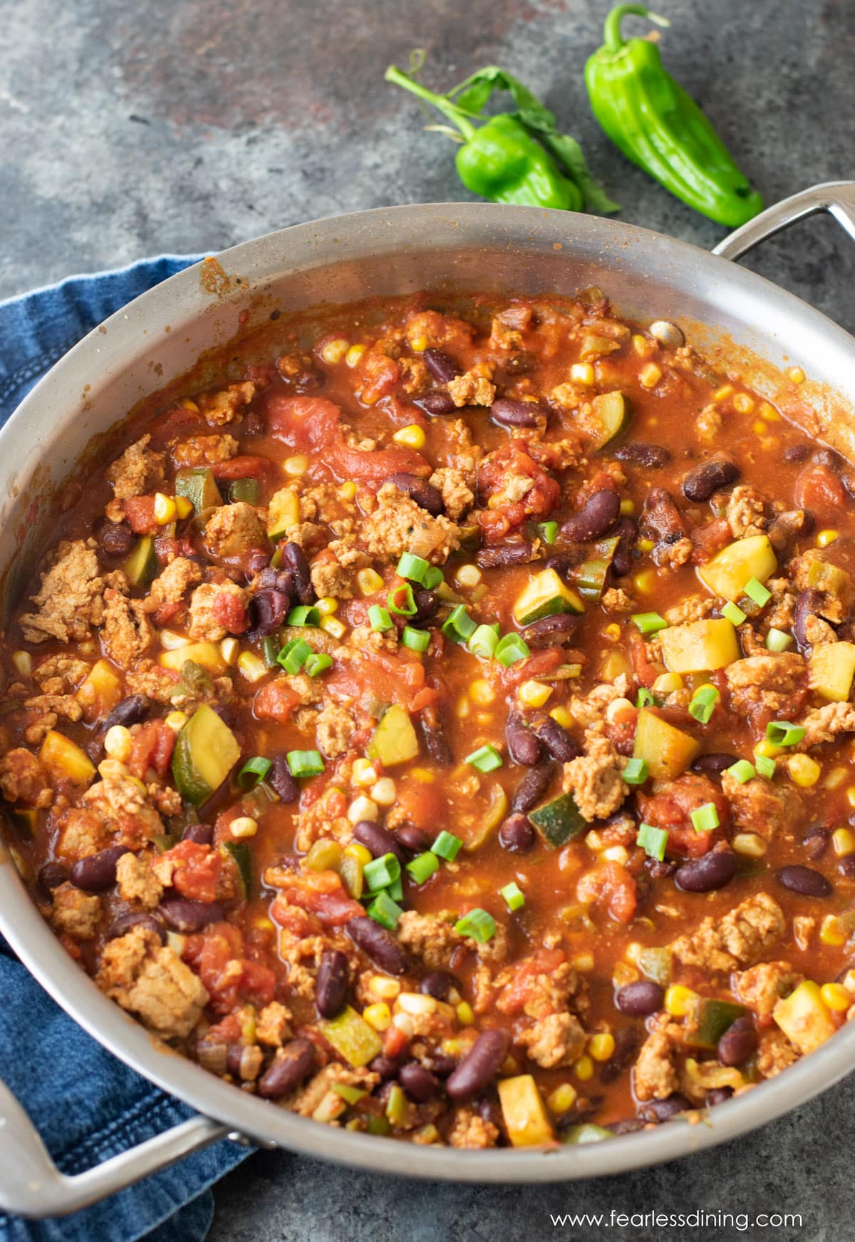 A large pan filled with the cooked chili.