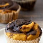 A Pinterest image of chocolate pumpkin muffins.