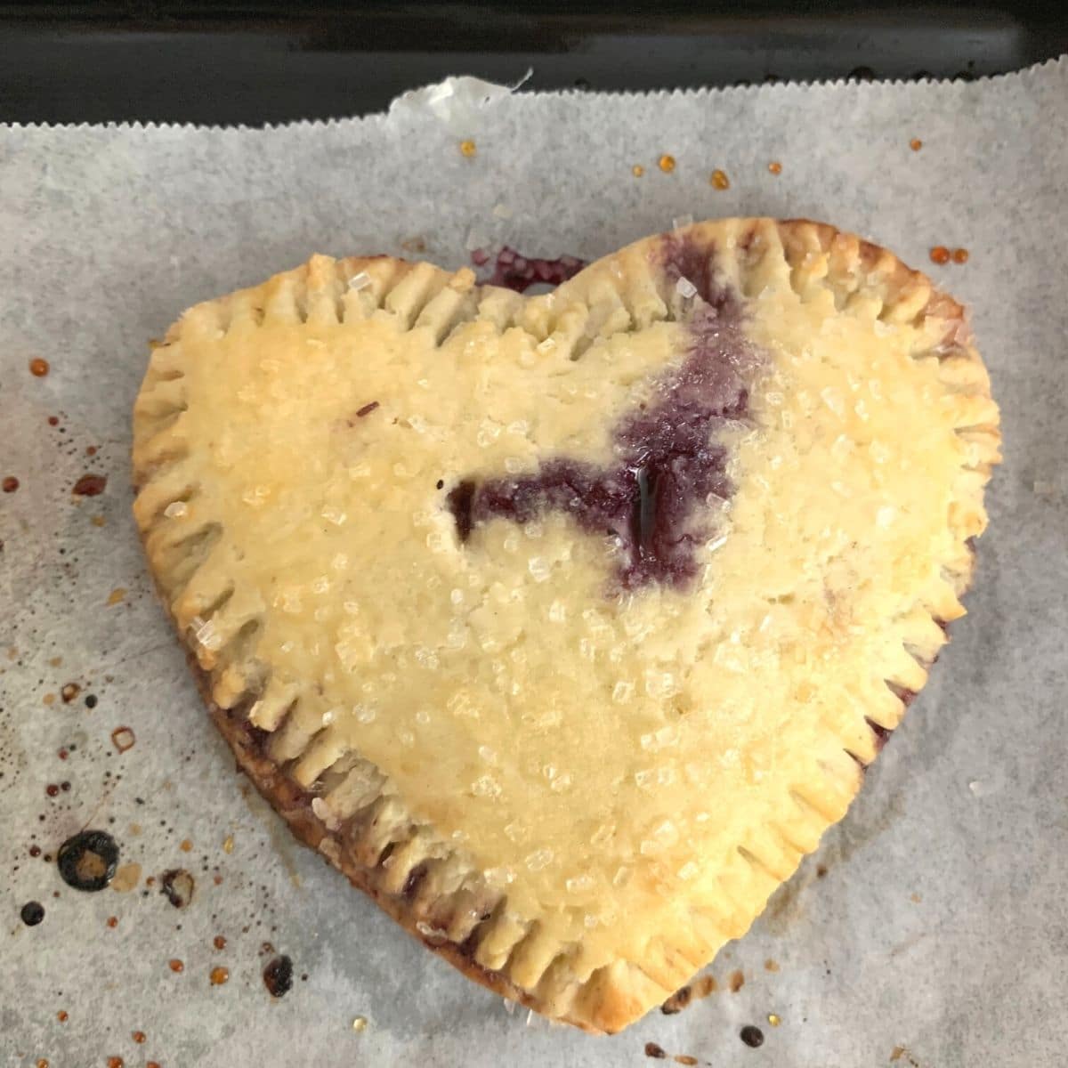 An oven baked heart shaped hand pie.