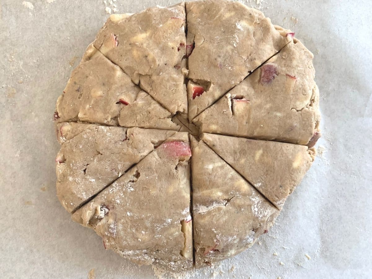 scone dough scored along cut lines