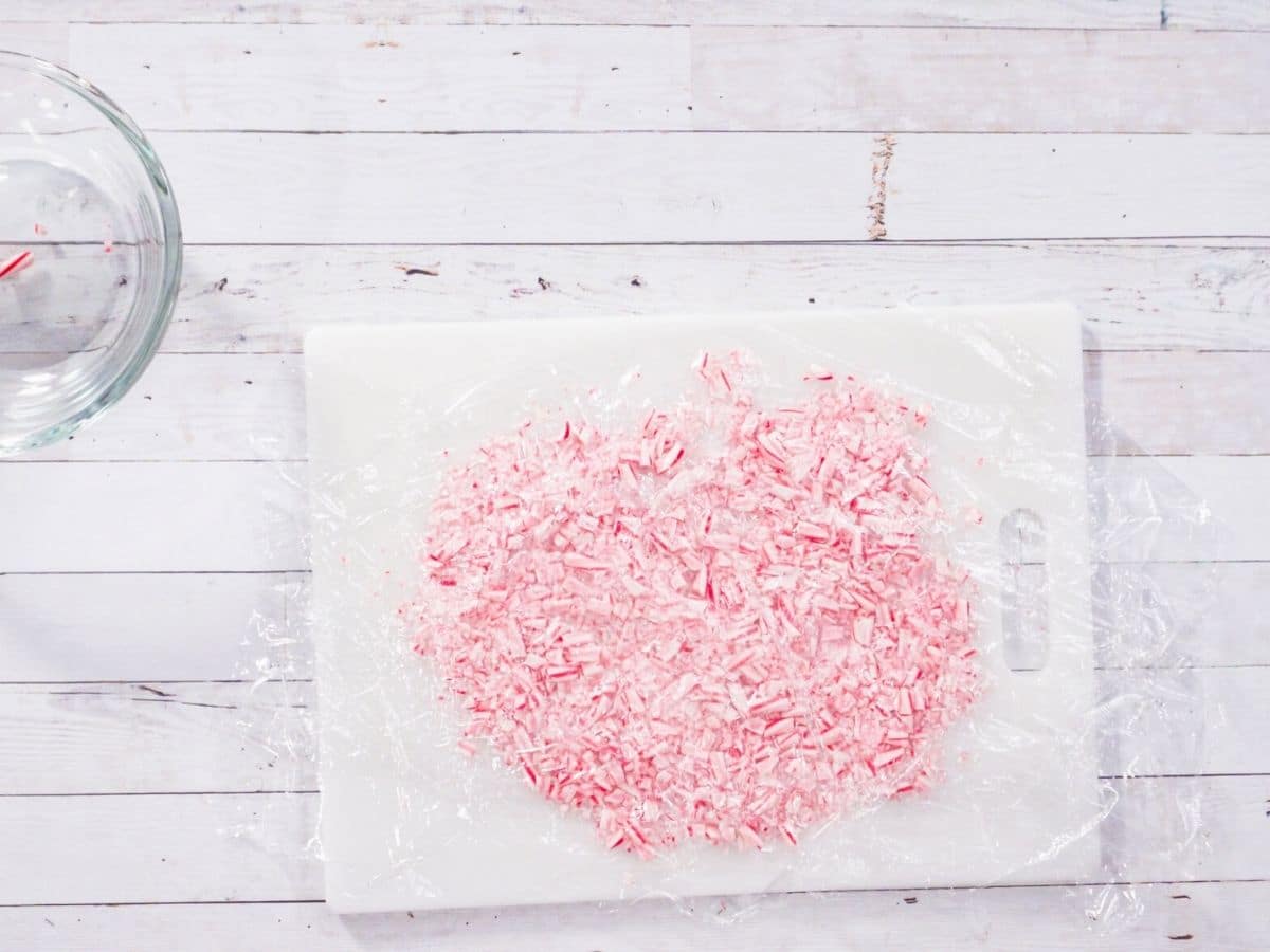 Crushed candy canes on a cutting board.