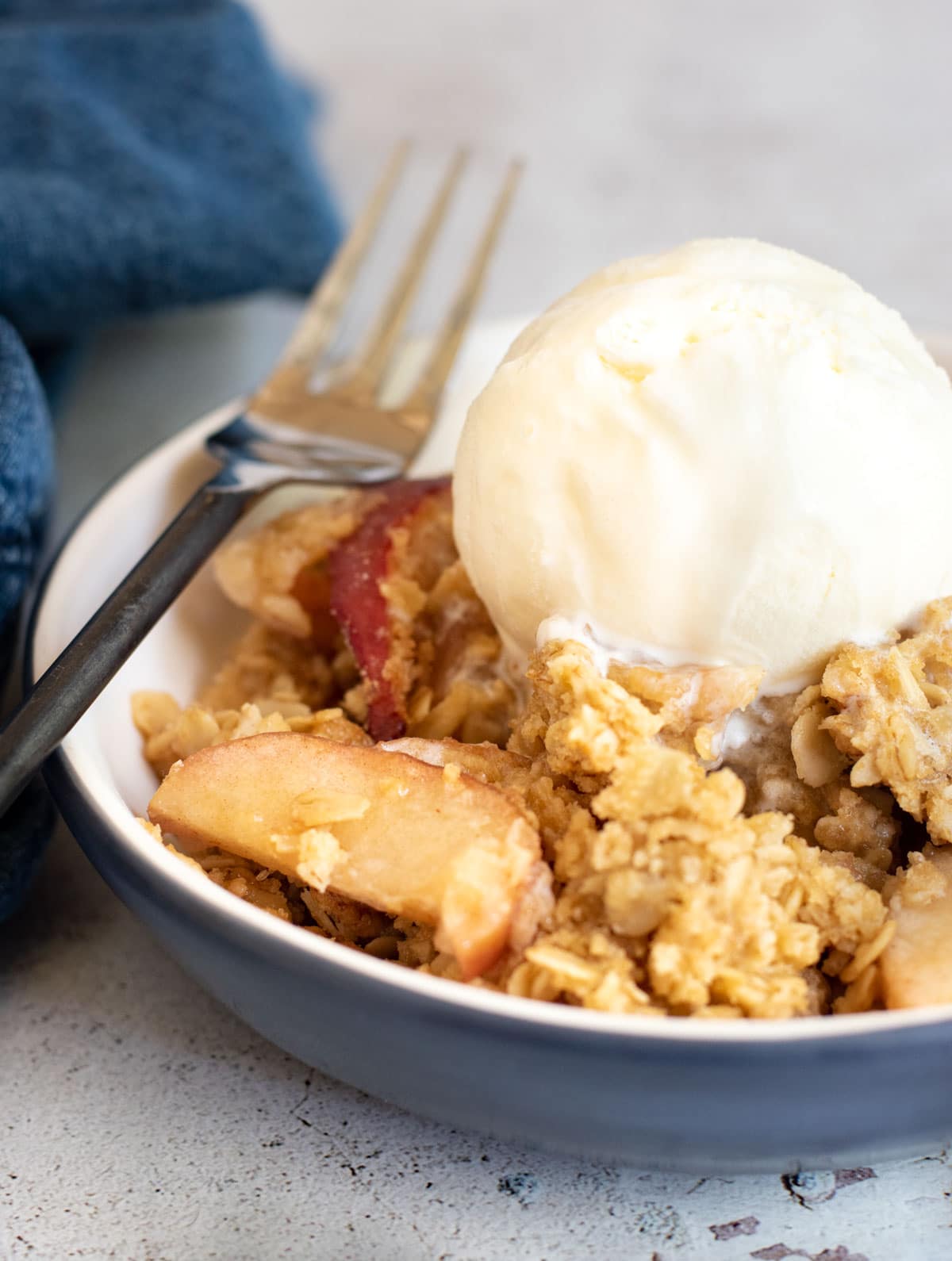 A big bowl of apple crisp ala mode.