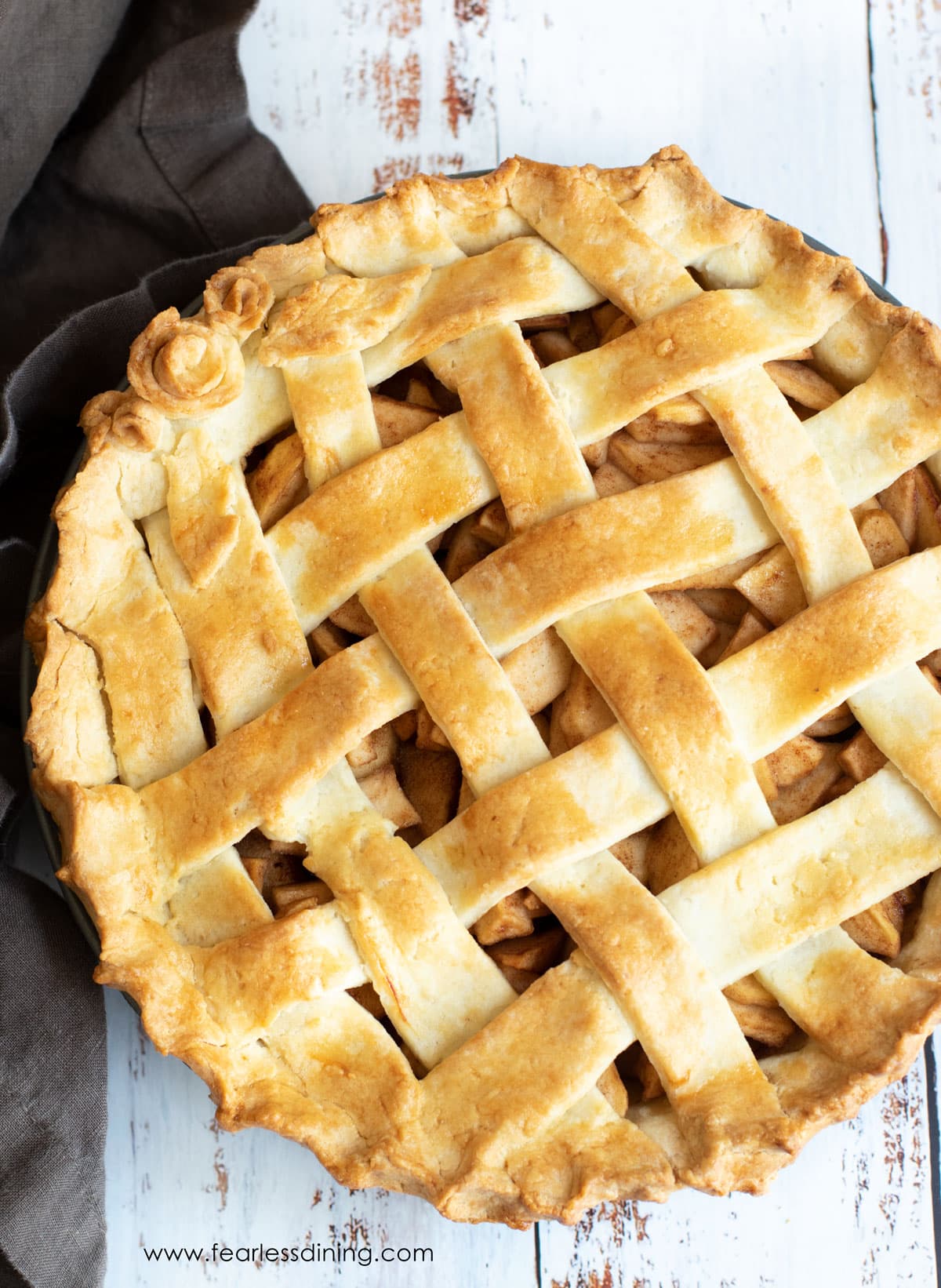 A gluten free apple pie with a lattice crust.