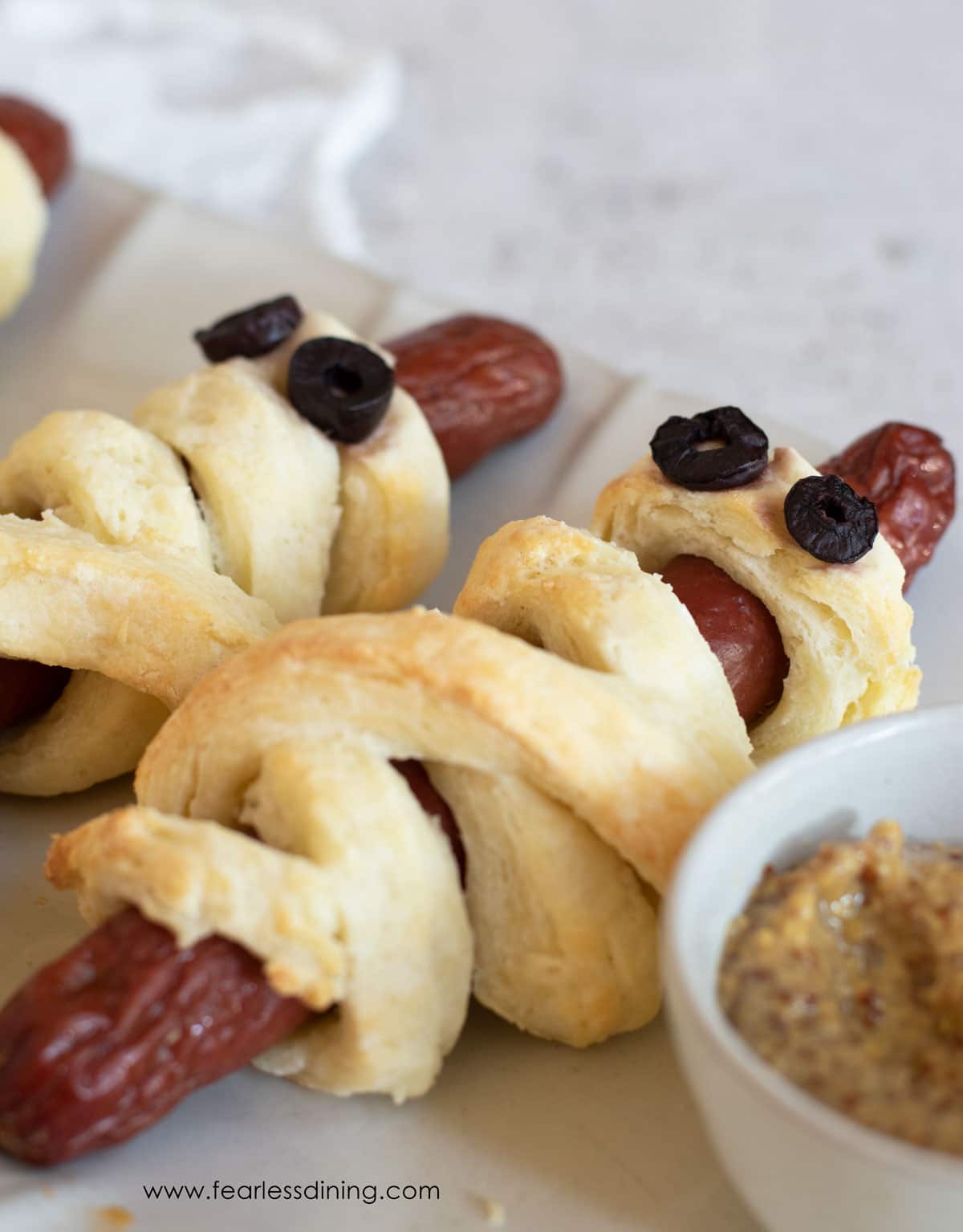 Gluten free pigs in a blanket like mummies for Halloween.