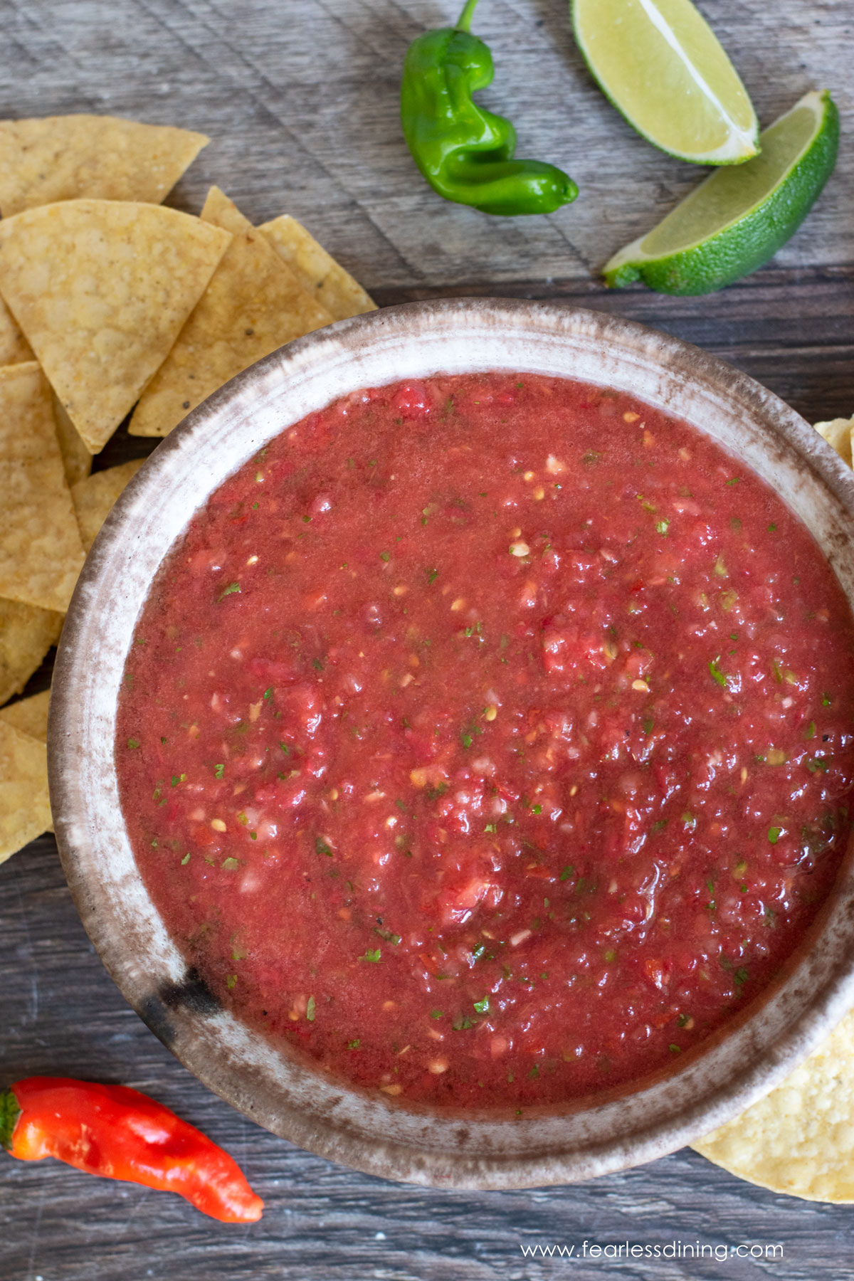 The top view of a bowl of padron pepper salsa.