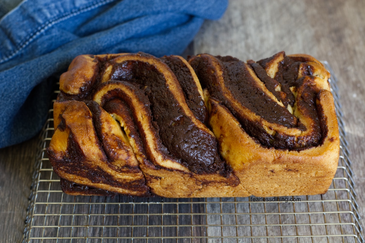 The babka cooling on a cooling rack.
