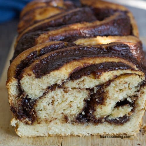 A sliced gluten free babka so you can see the chocolate swirls inside.