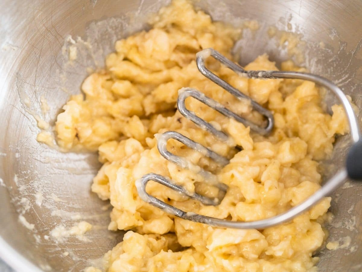 Mashed banana in a bowl.