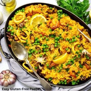 A serving platter filled with gluten-free paella.