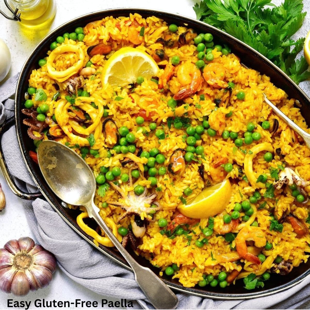 A serving platter filled with gluten-free paella.