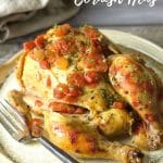 A Pinterest image of a cooked cornish hen on a plate.